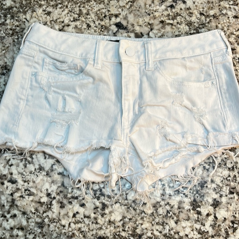 Express white cut off shorts. Size 4